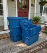 Stacked ReCrate totes delivered on a Louisville front porch, ready for a move